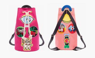 Backpacks decorated with embroidered colourful patches.