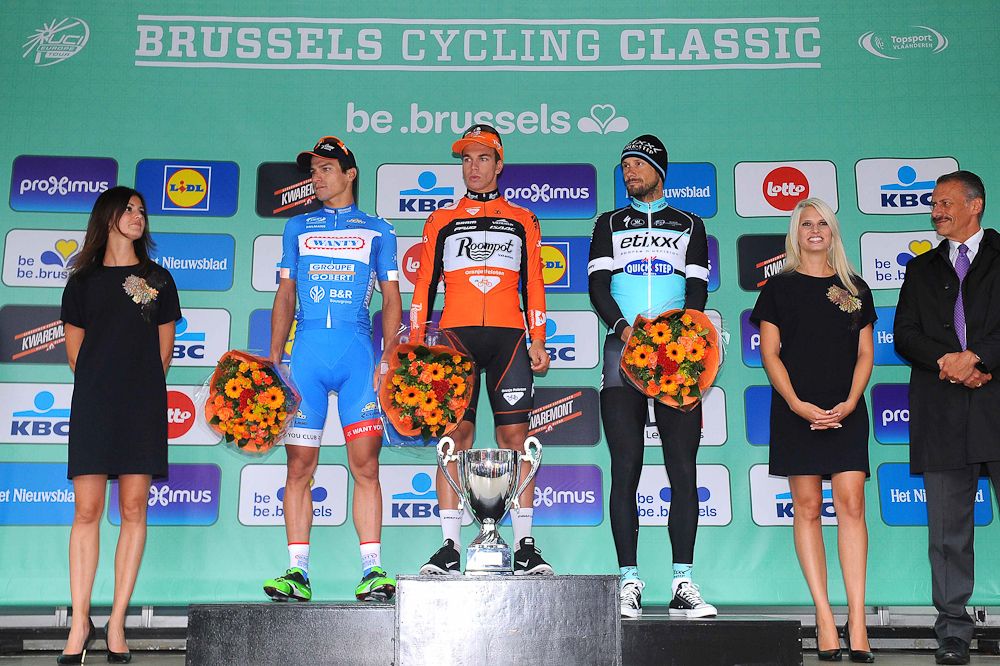 Roy Jans, Dylan Groenewegen and Tom Boonen on the Brussels podium.