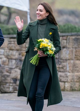 Kate Middleton holding a bouquet of flowers in Wales