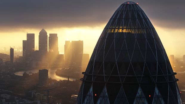 LONDON - FEBRUARY 25: The sun rises over the City of London on February 25, 2010 in London, United Kingdom. As the UK gears up for one of the most hotly contested general elections in recent 