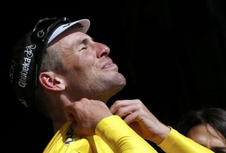 Mark Cavendish on the podium after winning Stage 1 and taking the first yellow jersey of the 2016 Tour de France (Watson)