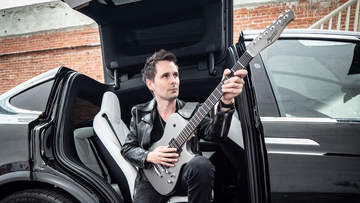 Young Man Playing Guitar At A Car At The Coast High-Res Stock Photo - Getty  Images
