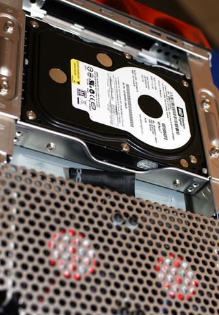 The SDXi has three drive bays, but this particular model uses one bay for an internally mounted liquid cooling system.