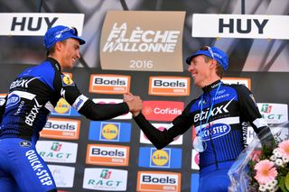 Julian Alaphilippe and Dan Martin shakes hands on the Fleche Wallonne podium