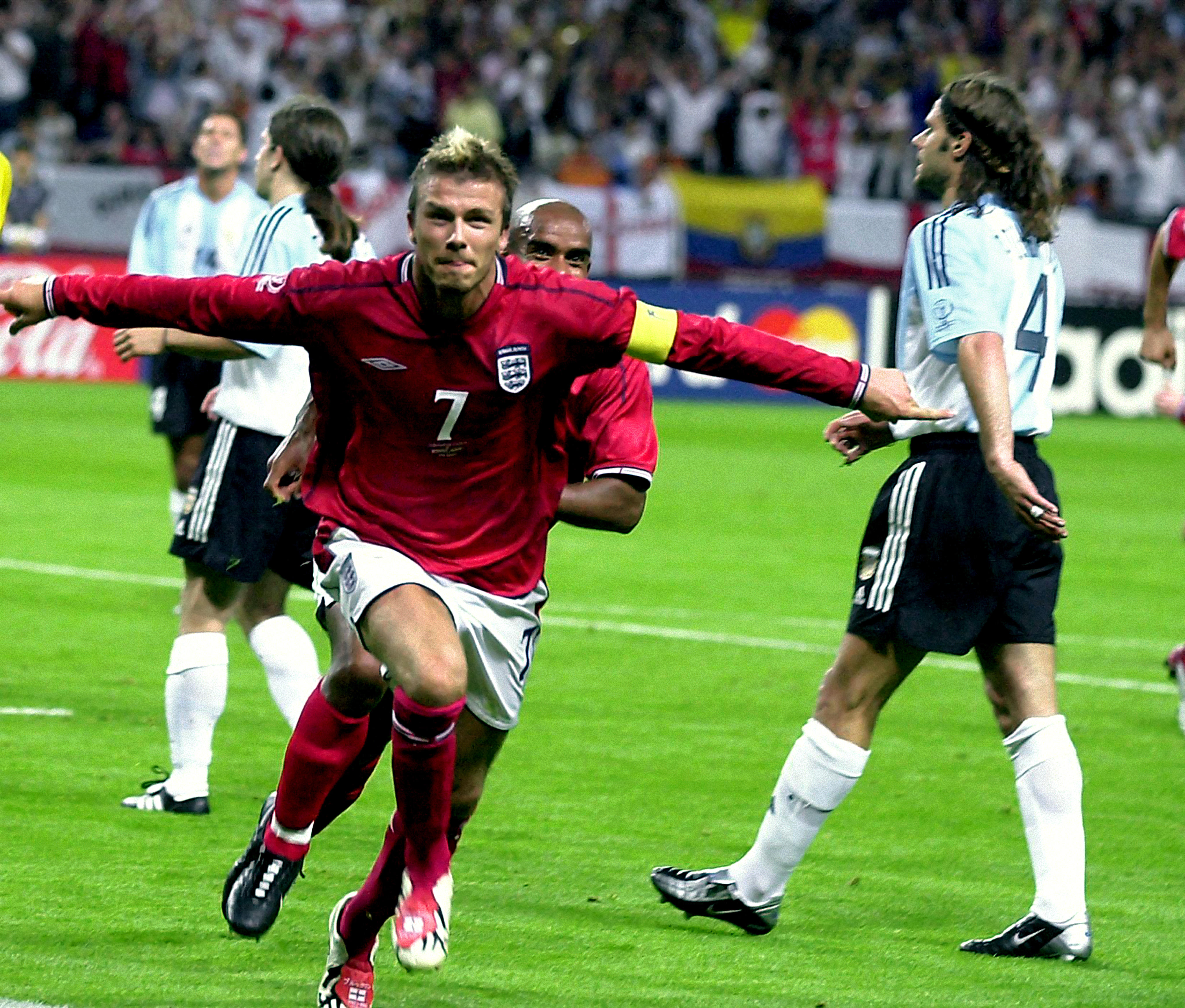 David Beckham celebrates after scoring England's winning goal, a penalty, against Argentina at the 2002 World Cup