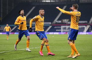 Everton celebrate their winner at West Brom