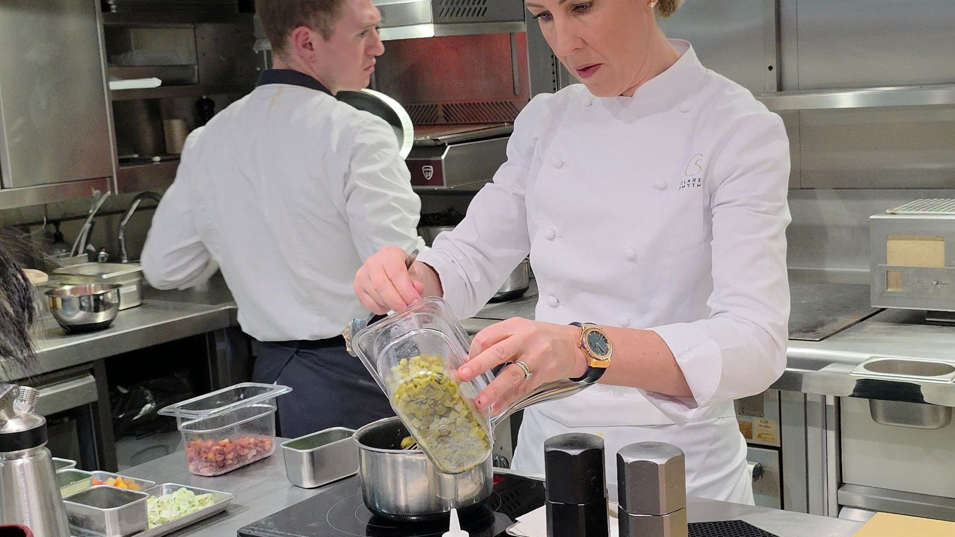 Clare Smyth Corenucopia adding gherkin to dish
