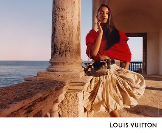 a model poses in the Louis Vuitton women's Cruise 2025 ad campaign