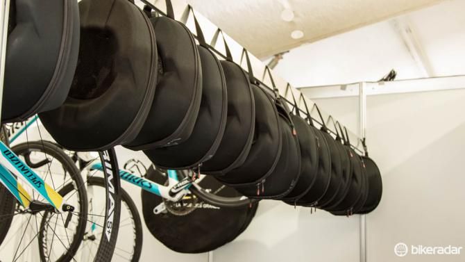 Astana's Specialized helmets are stored between uses