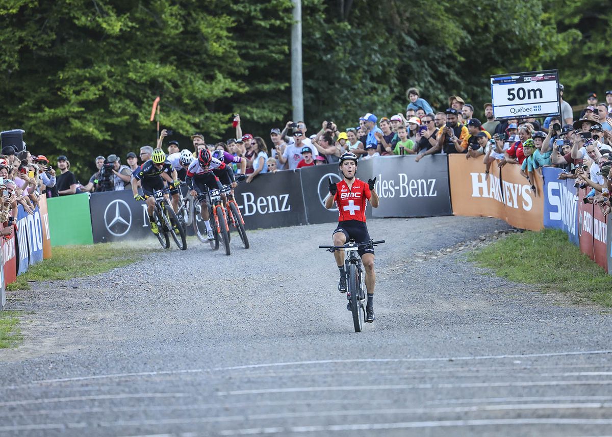 Filippo Colombo (BMC) sprints to victory in the XCC race at the UCI MTB World Cup Mont-Sainte-Anne