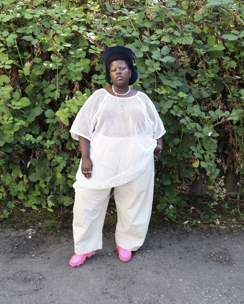 Lydia Okello wearing a white outfit