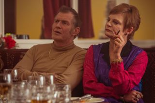 Jason Flemyng and Martha Plimpton as Albert Lord and wife Mint Ma.
