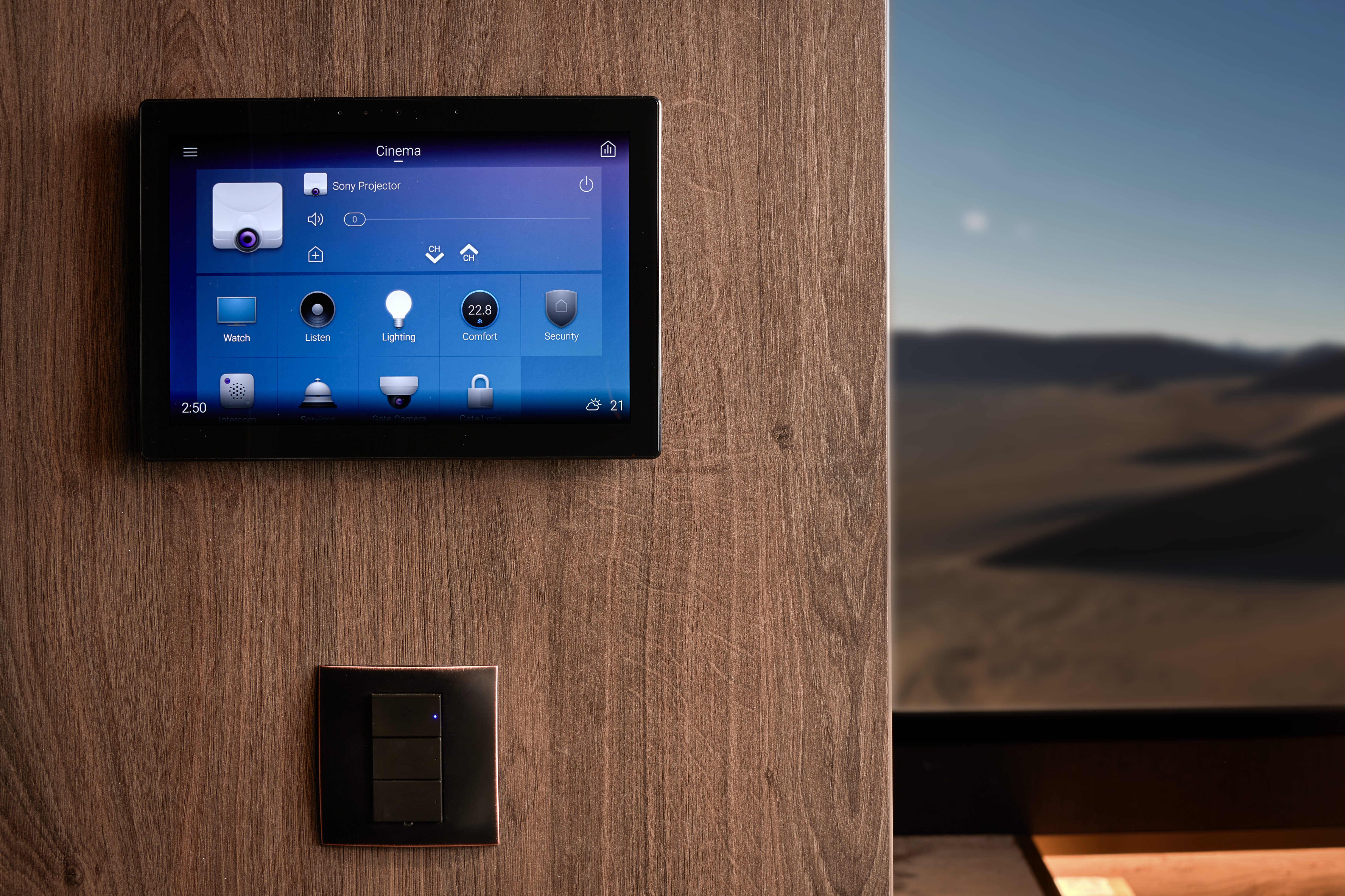 Control4 touchpad on a brown wall