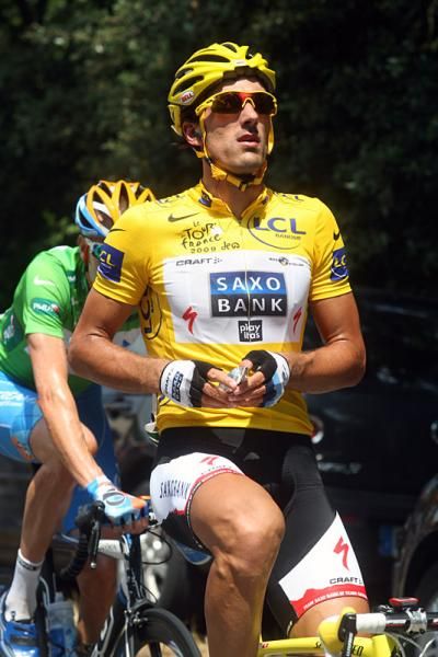 Fabian Cancellara grabs a bite to eat in stage two.