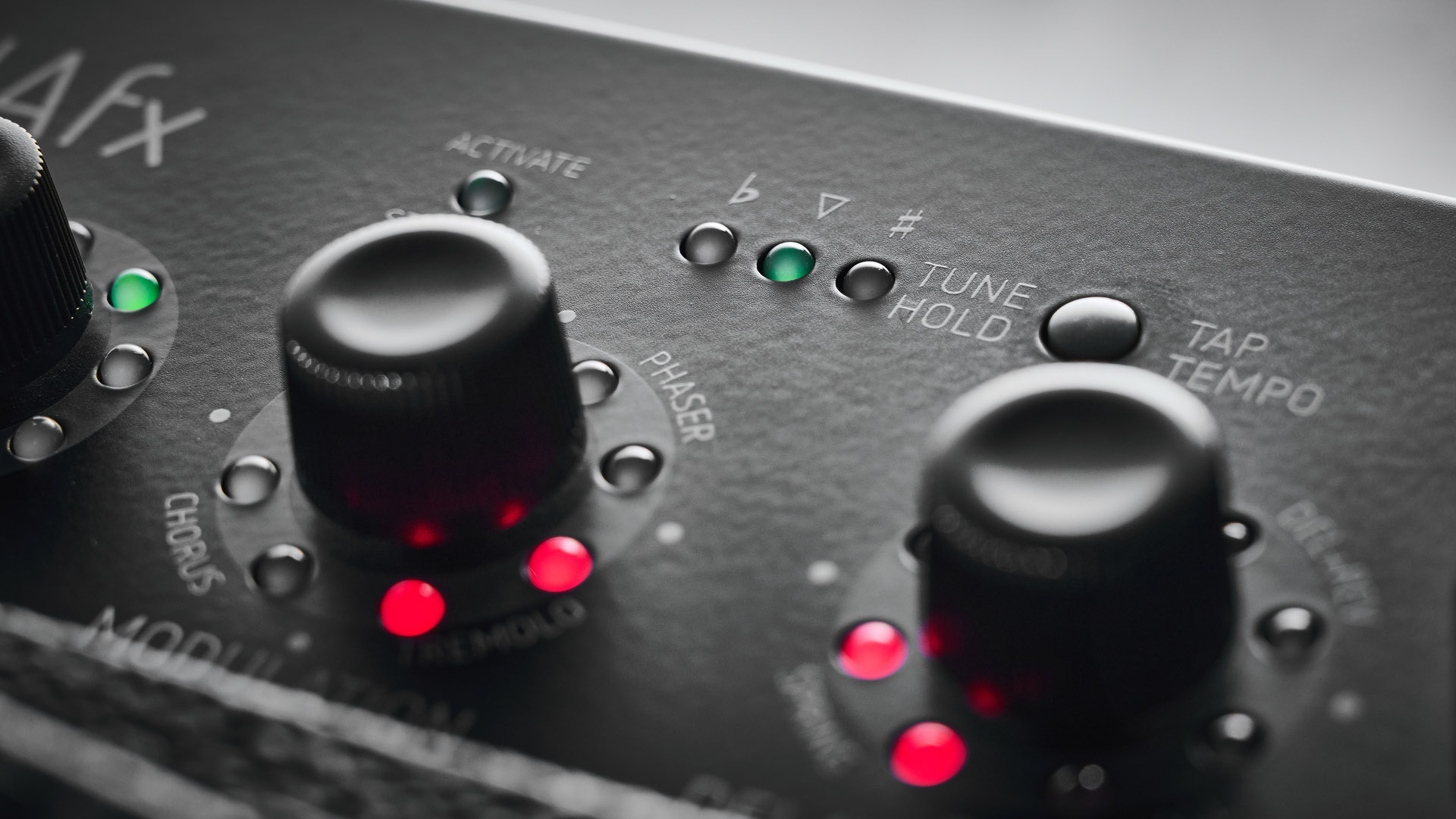 Harley Benton DNAFX AmP20: the compact 1/8&quot; modelling combo is finished in black and photographed in close-up and against a slate floor