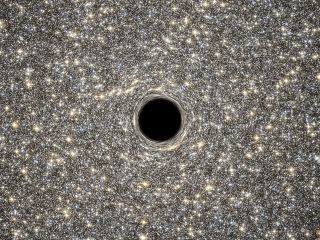 Supermassive Black Hole Within M60-UCD1