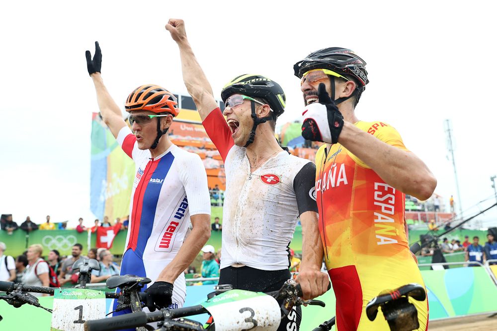 Second placed Czech Republic's Jaroslav Kulhavy, winner Switzerland's Nino Schurter and third placed Spain's Carlos Coloma