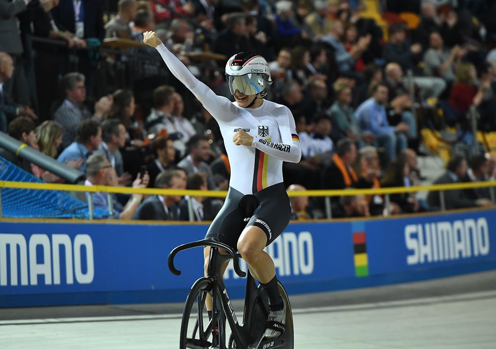 Germany's Miriam Welte celebrates after victory in the women's team sprint final race at The UCI World Cycling Championships in Apeldoorn