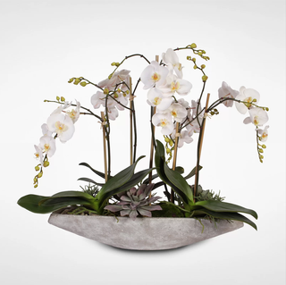 Faux orchid centerpiece.