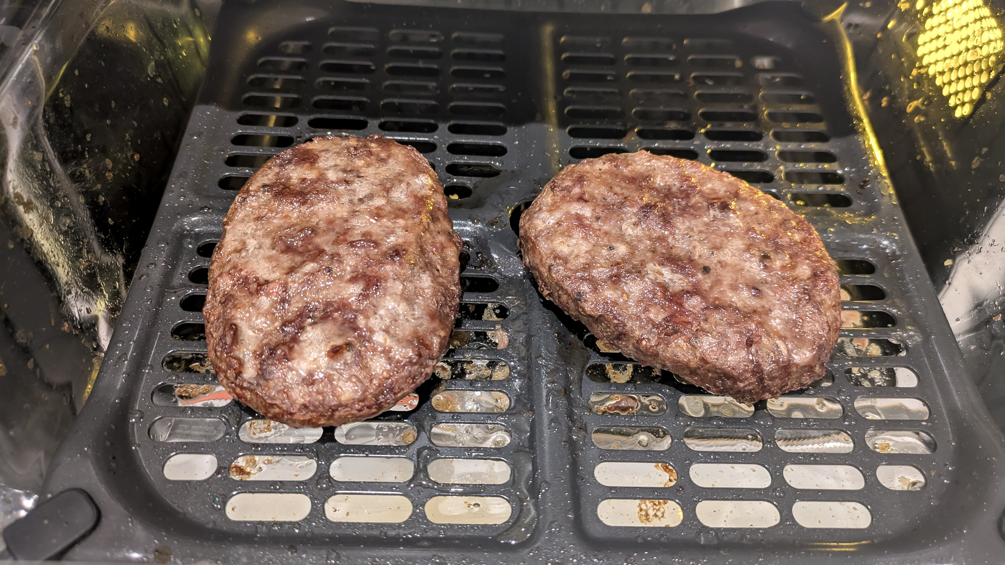 Ninja Crispi Microwave cooking beefburgers using the air fry function