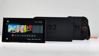 Nintendo Switch 2, Dock, Joy-Con 2 Grip, and Straps displayed on a white desk.