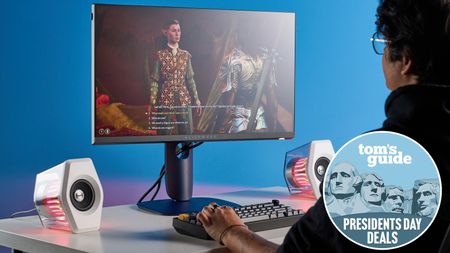 Person playing on Alienware AW2525HM monitor with Tom's Guide Presidents Day deals badge