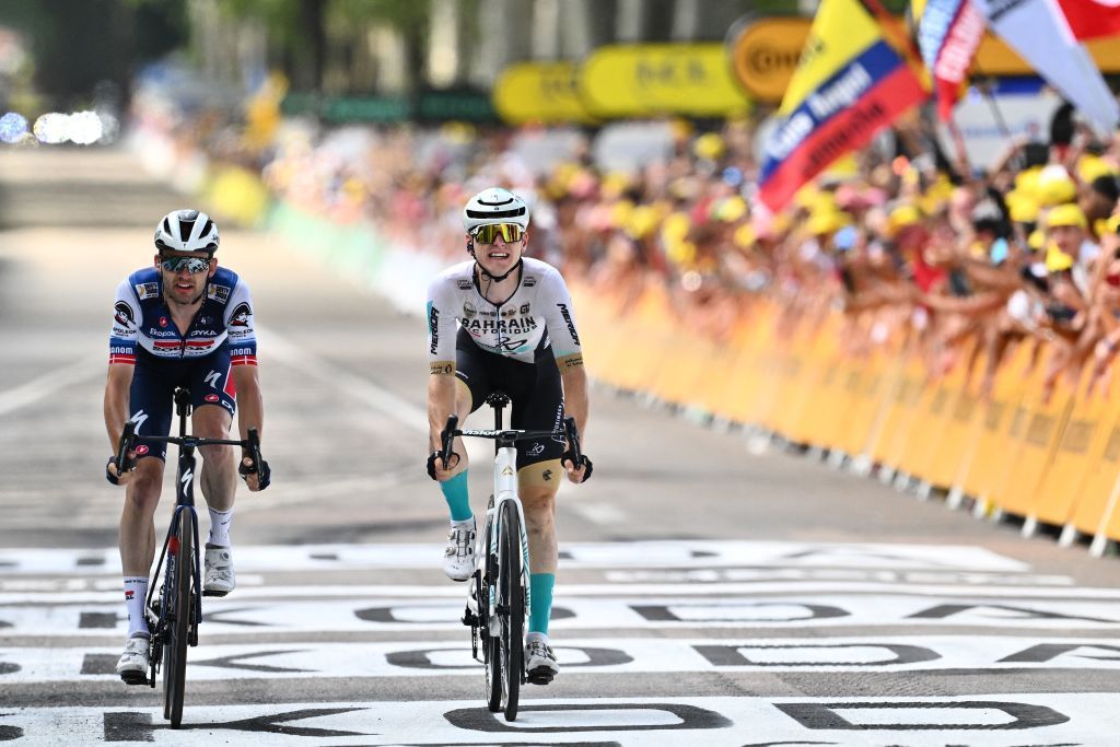 Bahrain Victorious Slovenian rider Matej Mohoric R cycles past the finish line with Soudal QuickSteps Danish rider Kasper Asgreen L to win the 19th stage of the 110th edition of the Tour de France cycling race 173 km between MoiransenMontagne and Poligny in the Jura department of centraleastern France on July 21 2023 Photo by Marco BERTORELLO AFP Photo by MARCO BERTORELLOAFP via Getty Images