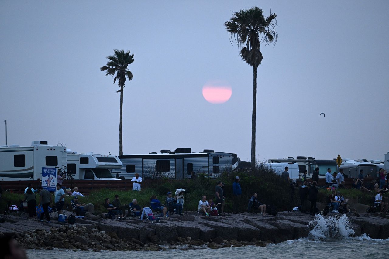 Spectators wait for SpaceX's Starship to launch from Boca Chica, Texas on April 20, 2023