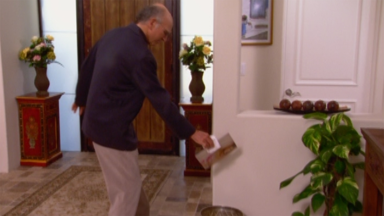 Larry throwing out a magazine in Curb Your Enthusiasm