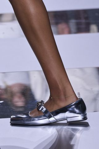Silver shoes on the Versace runway