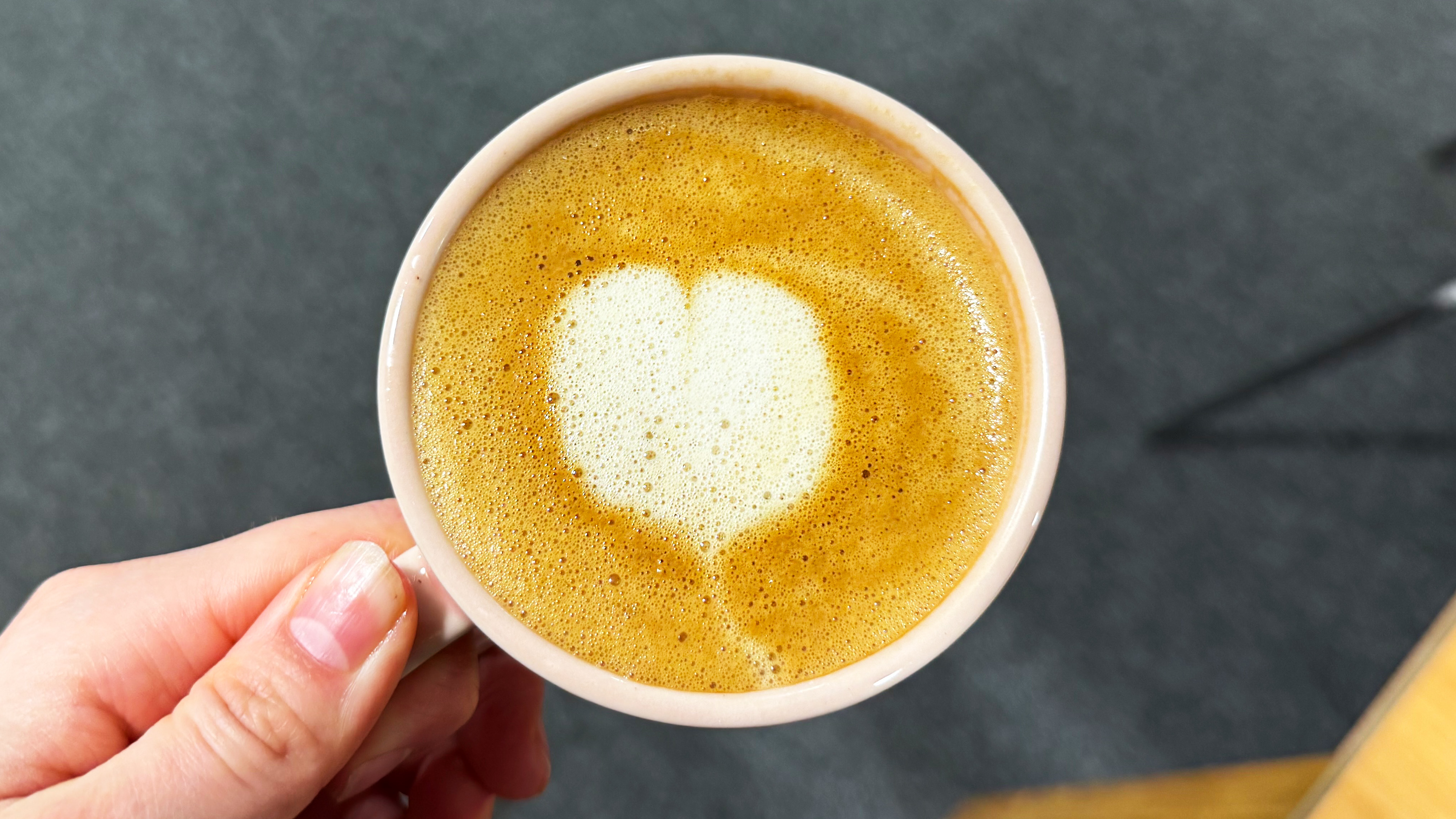 a photo of a latte made on the de'longhi linea classic