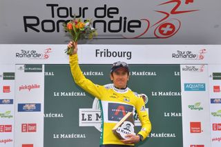FRIBOURG SWITZERLAND MAY 02 Geraint Thomas of The United Kingdom and Team INEOS Grenadiers Yellow Leader Jersey celebrates at podium during the 74th Tour De Romandie 2021 Stage 5 a 1619km Individual Time Trial stage from Fribourg to Fribourg 614m Cheese Trophy ITT TDR2021 TDRnonstop UCIworldtour on May 02 2021 in Fribourg Switzerland Photo by Luc ClaessenGetty Images