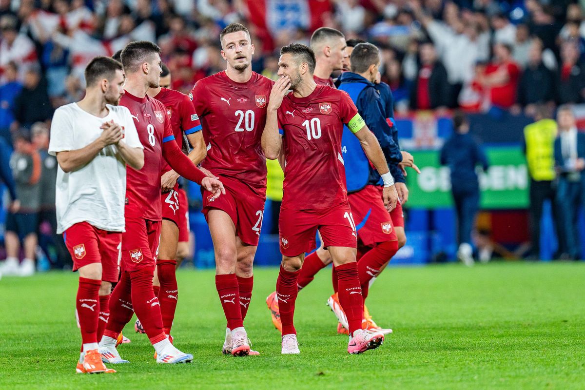 Serbia players in discussion after their match against England at Euro 2024