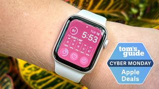 Person wearing the Apple Watch SE 2022 with the Tom's Guide Cyber Monday deal badge