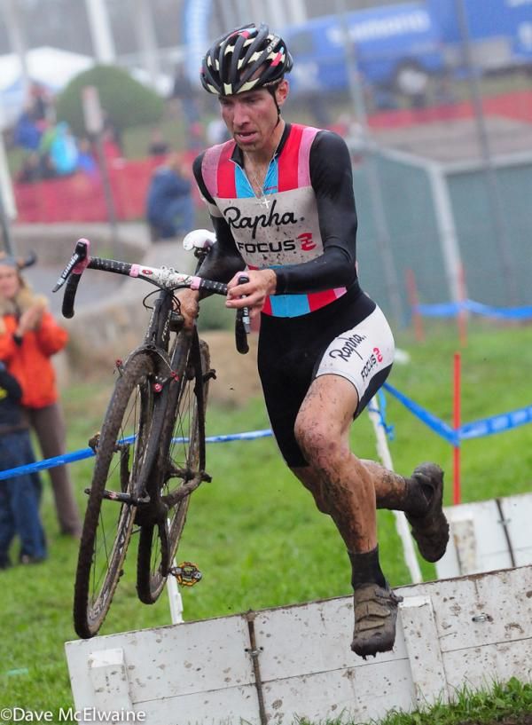 Jeremy Powers (Rapha-Focus) runs the barriers with one lap to go