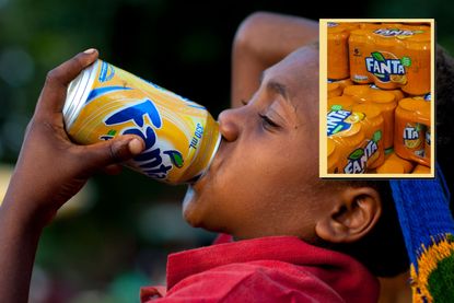 Child drinking can of Fanta and drop in of Fanta multi-pack