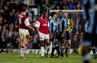 21 April 1997 Coventry - FA Carling Premiership - Coventry v Arsenal - Ian Wright of Arsenal and Paul Williams of Coventry City. (Photo by Mark Leech/Offside via Getty Images)