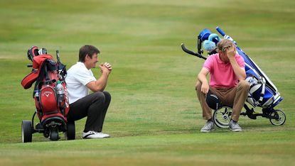 Golfer sit down and wait during a round
