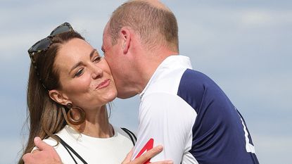 Prince William kisses Kate Middleton on the cheek