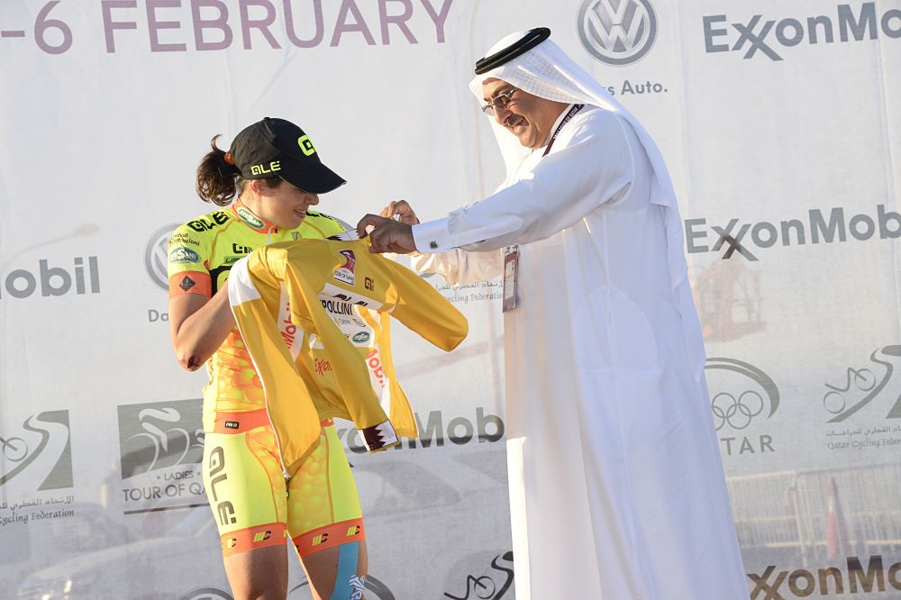 Annalisa Cucinotta (Ale-Cipollini) tries on the first leader's jersey of the Ladies Tour of Qatar