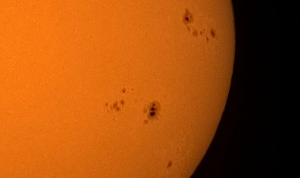 Sunspots on the solar surface, as imaged by the ZWO Seestar S50 Pro.