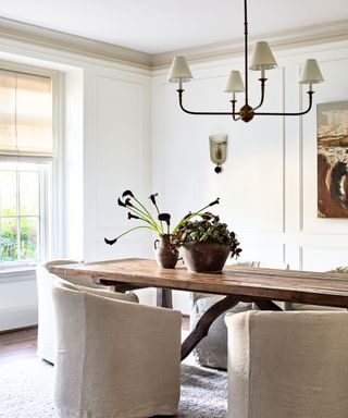 Neutral dining room by Storie Collective