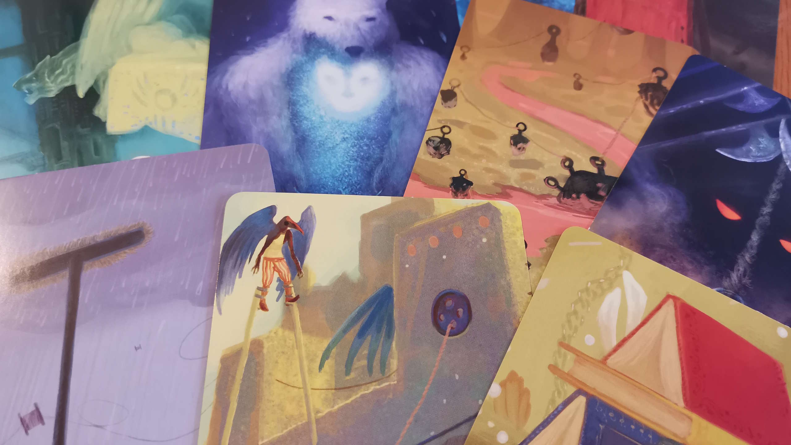 Mysterium's abstract art cards, depicting numerous dream-like images