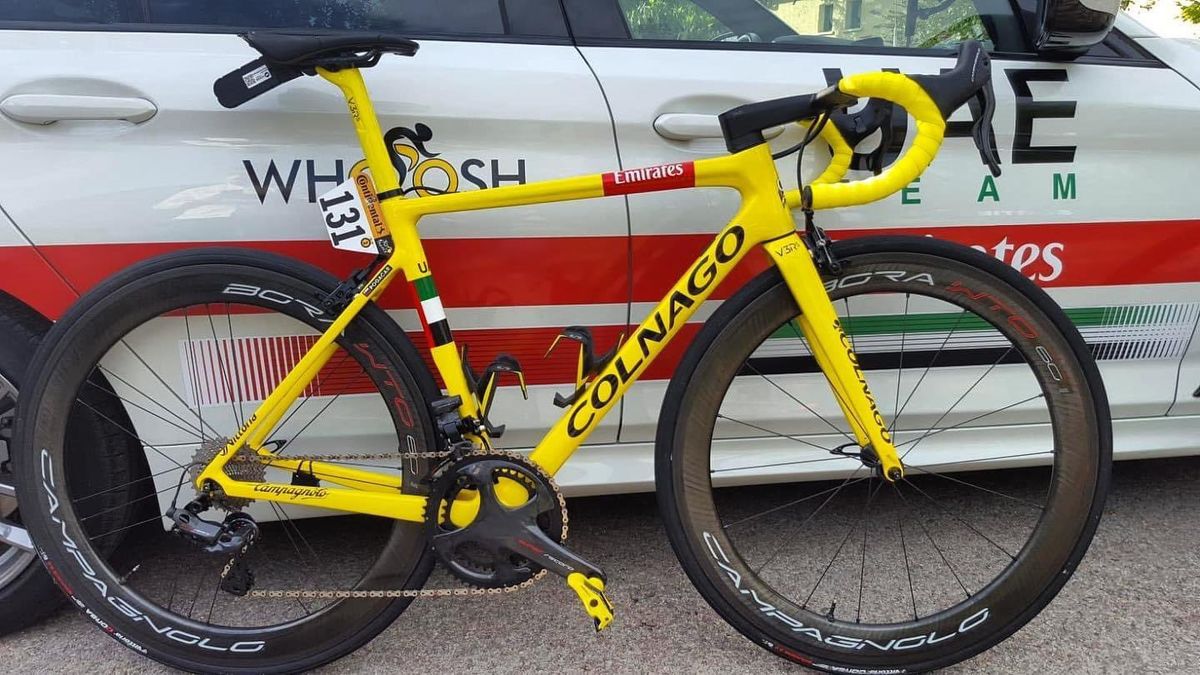 Tadej Pogacar Yellow bike
