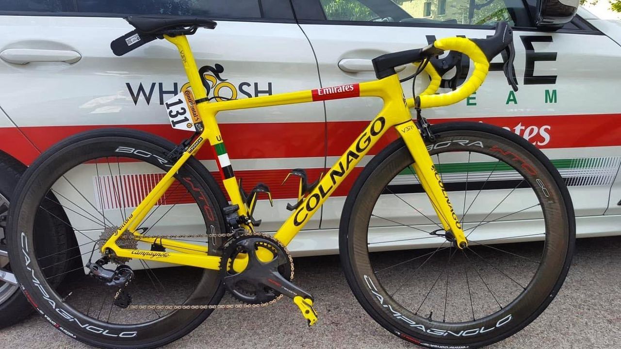 Tadej Pogacar Yellow bike