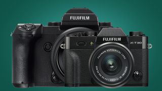 The Fujifilm GF50S and X-T30 cameras on a green background