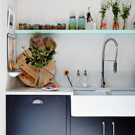 kitchen with deep ceramic butler sink and kitchen cabinets