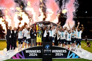 Frank Lampard and Jill Scott lift the trophy after England win Soccer Aid 2024.