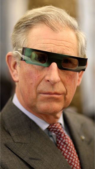 King Charles wearing 3D glasses.