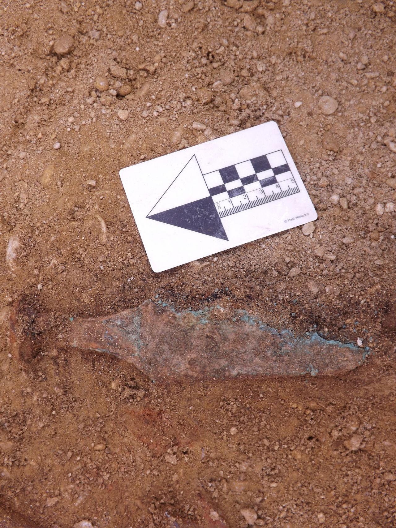 The copper dagger that was found in the chieftain's burial.